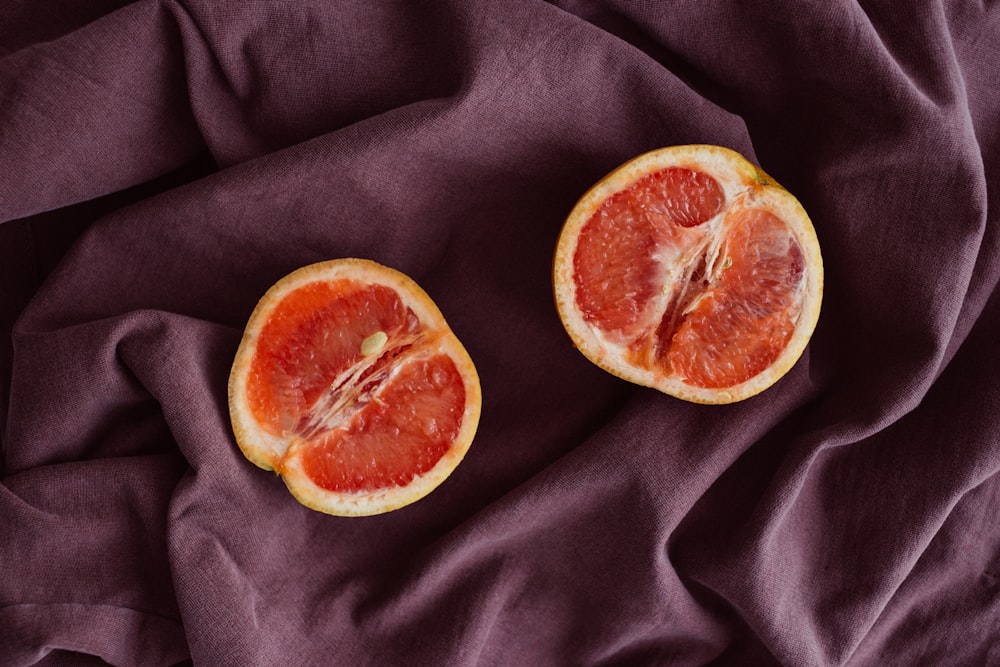 sliced red citrus fruit
