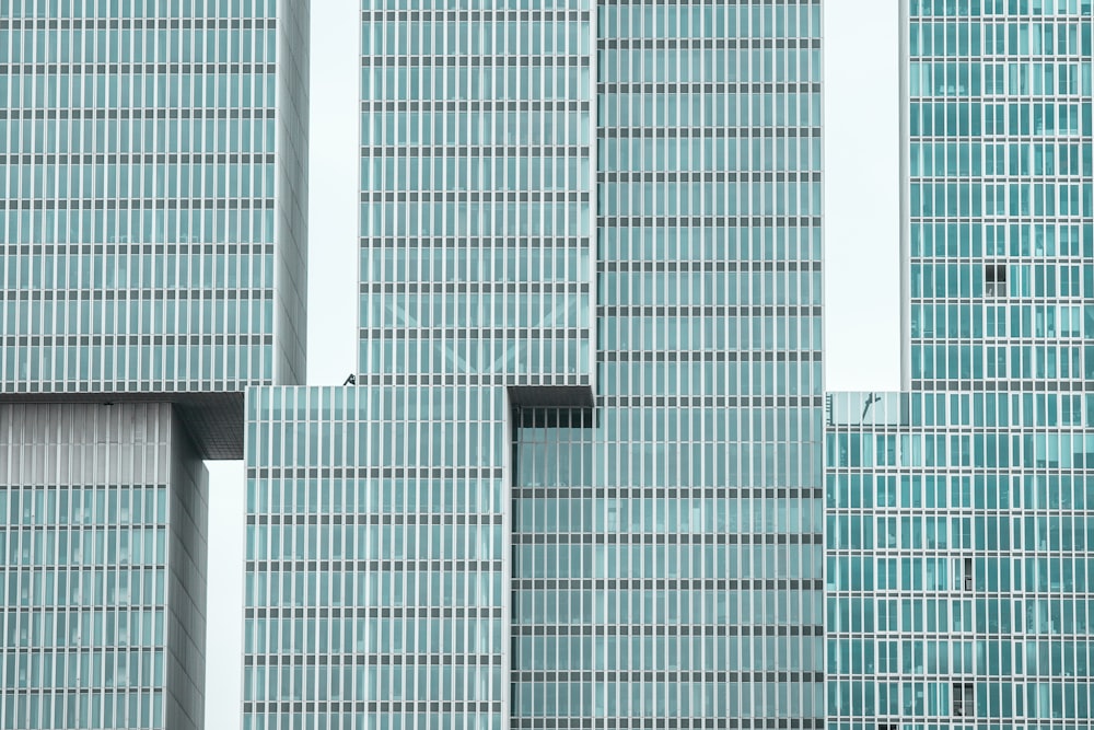 green and gray glass buildings