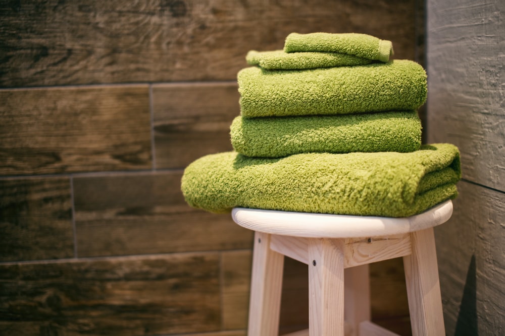 Cuatro toallas verdes