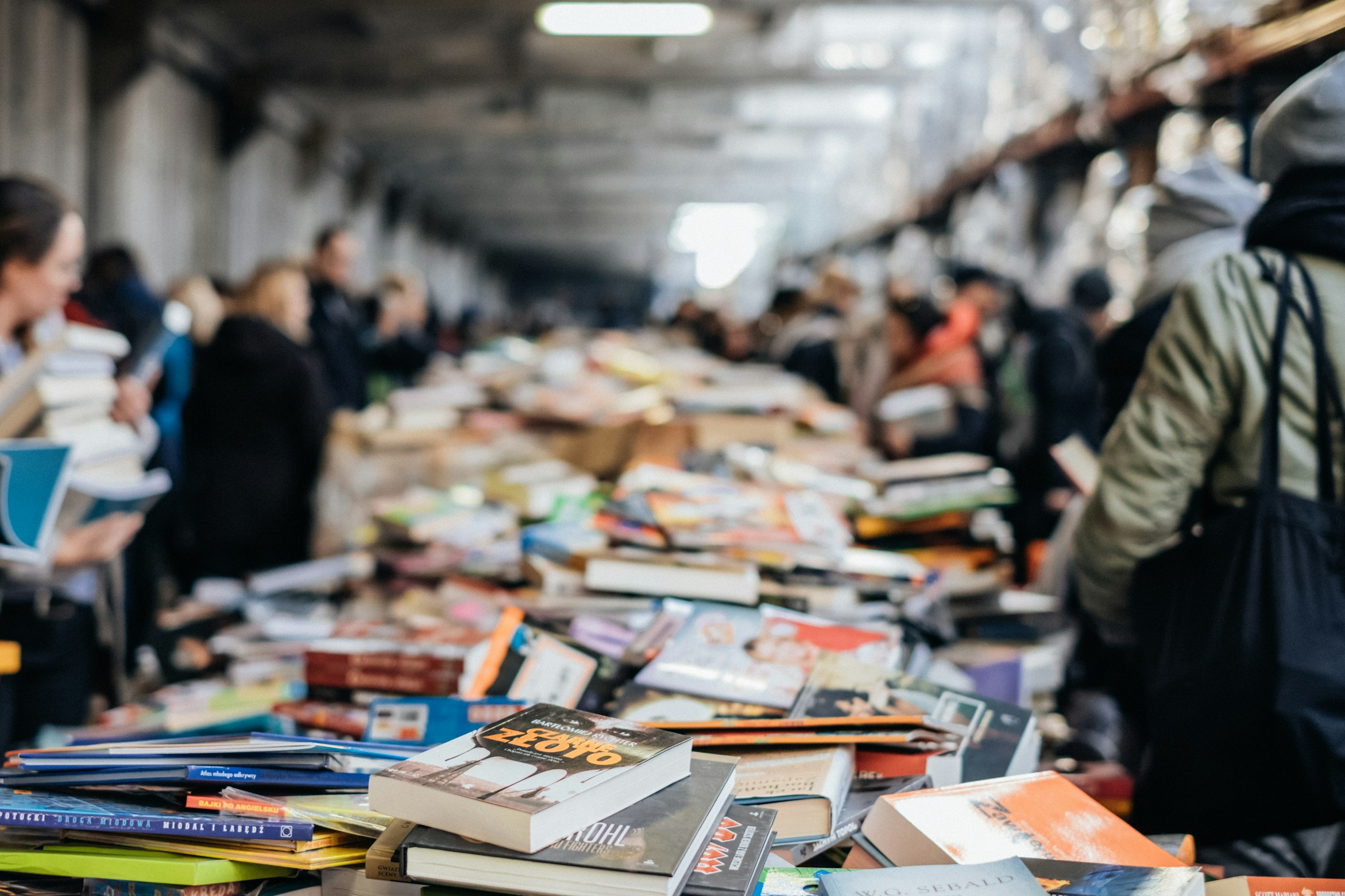Unsplash image from freestocks showing books messily displayed on a table