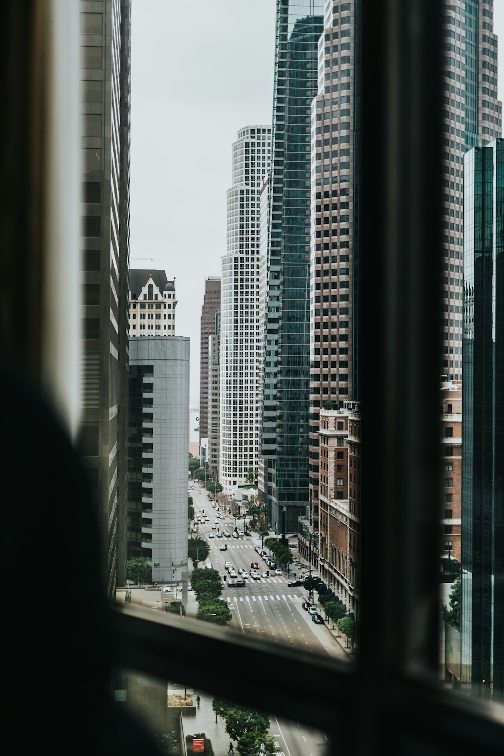 white, gray, and teal city buildings