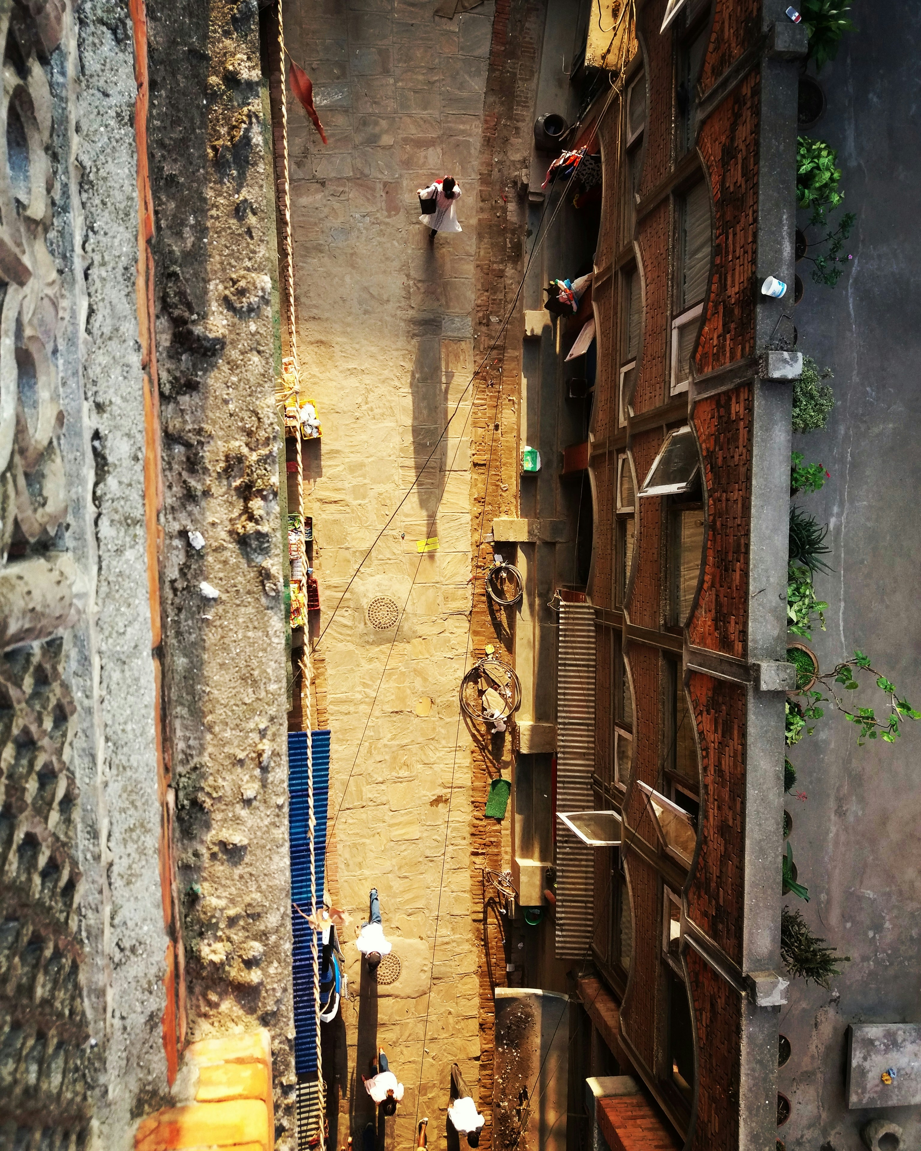 bird's eye view of alley in between buildings