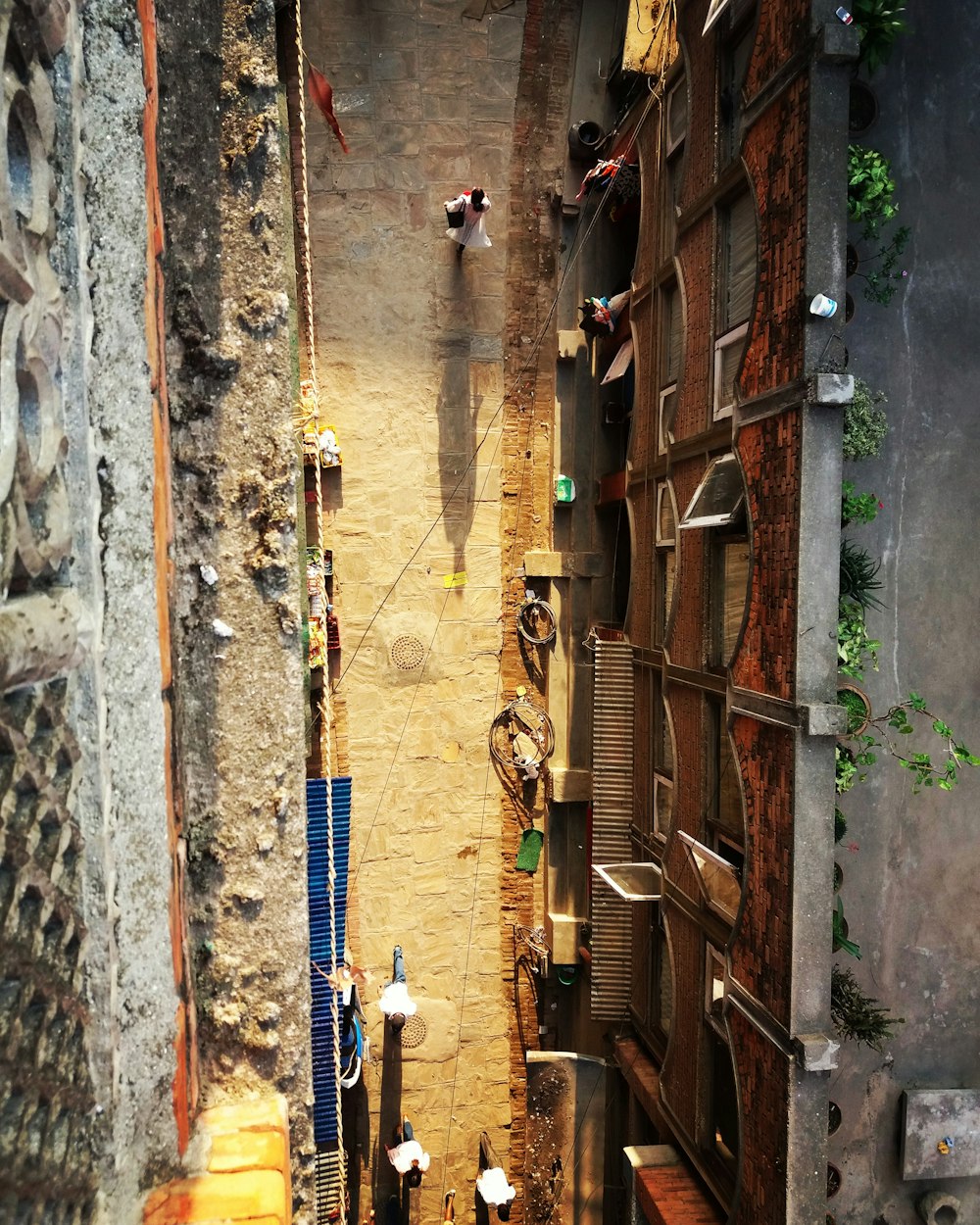 bird's eye view of alley in between buildings