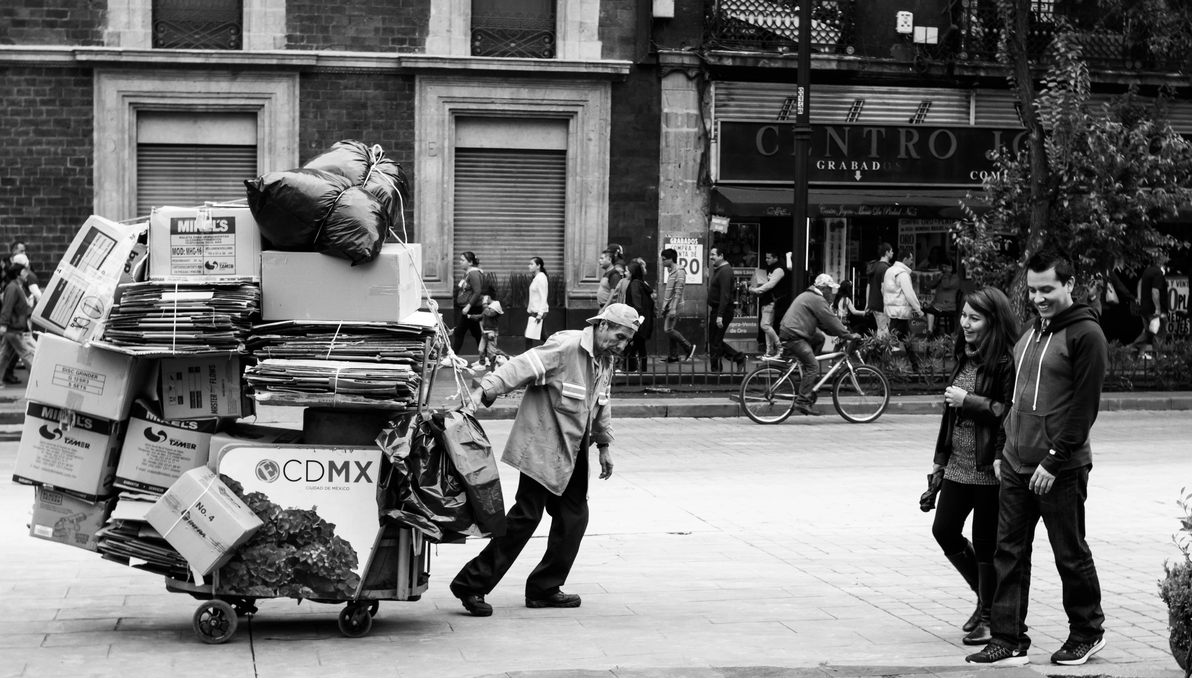 Junk removal professional carrying an item during an indoor cleanout