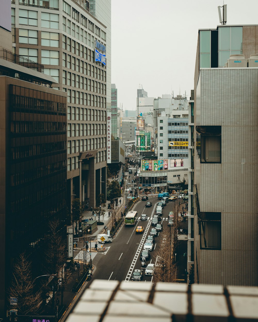 a view of busy street on a terrace