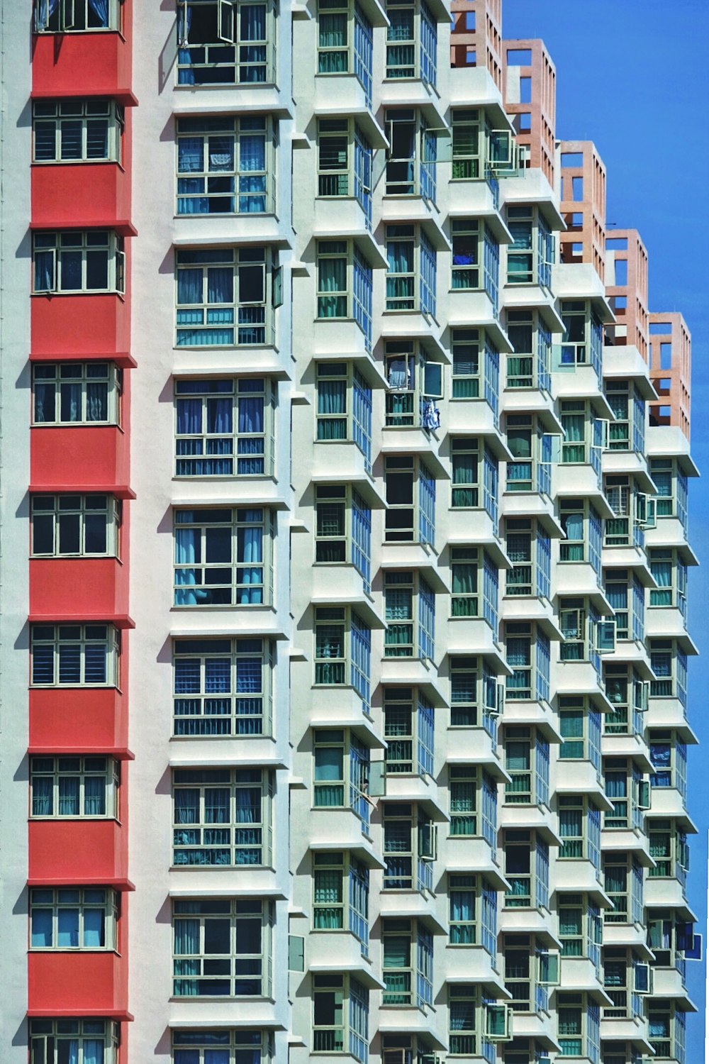 white and red building at daytime