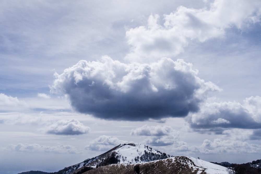 nimbus clouds on top of mountain