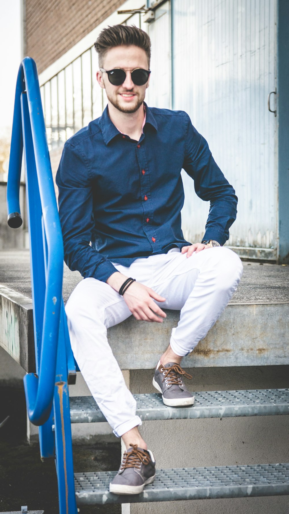 man sitting on stairs