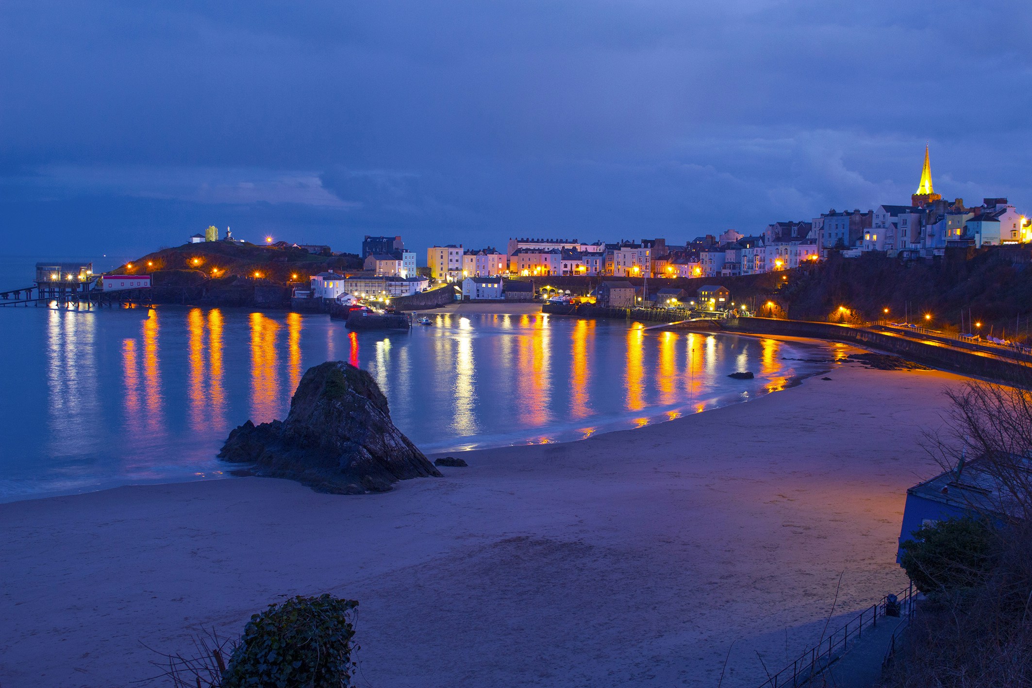 village near sea under white sky, Tenby harbour