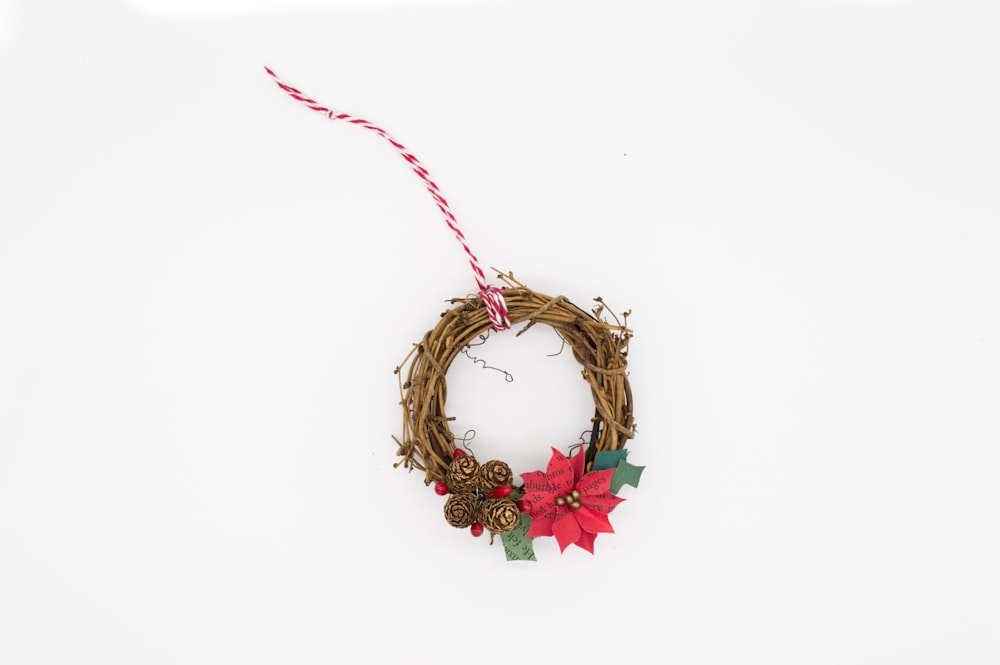 brown and red poinsettia wreath