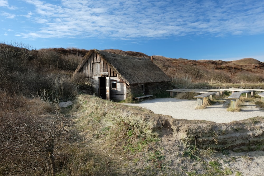 shed under cumulus clouds