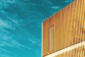 Close-up of fireproof wall panels installed on a modern construction site under bright daylight