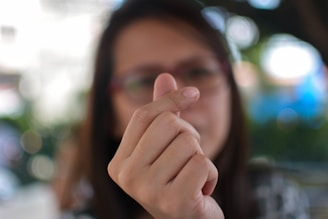 Close-up of a user typing a heartfelt comment on Facemeet.