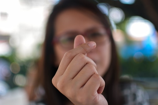 Close-up of a user typing a heartfelt comment on Facemeet.
