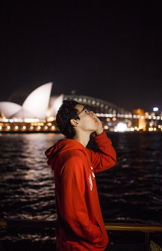 man looking up in Sydney Harbour Australia