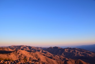 aerial photo of brown hills