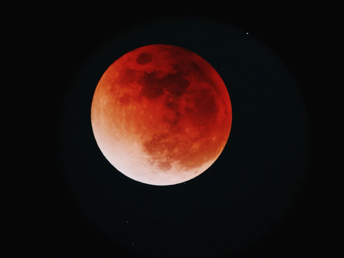 A deep red blood moon during total lunar eclipse