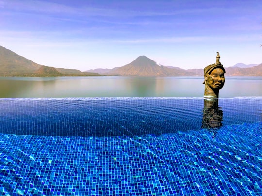 body of water surrounded of mountain in Lake Atitlán Guatemala