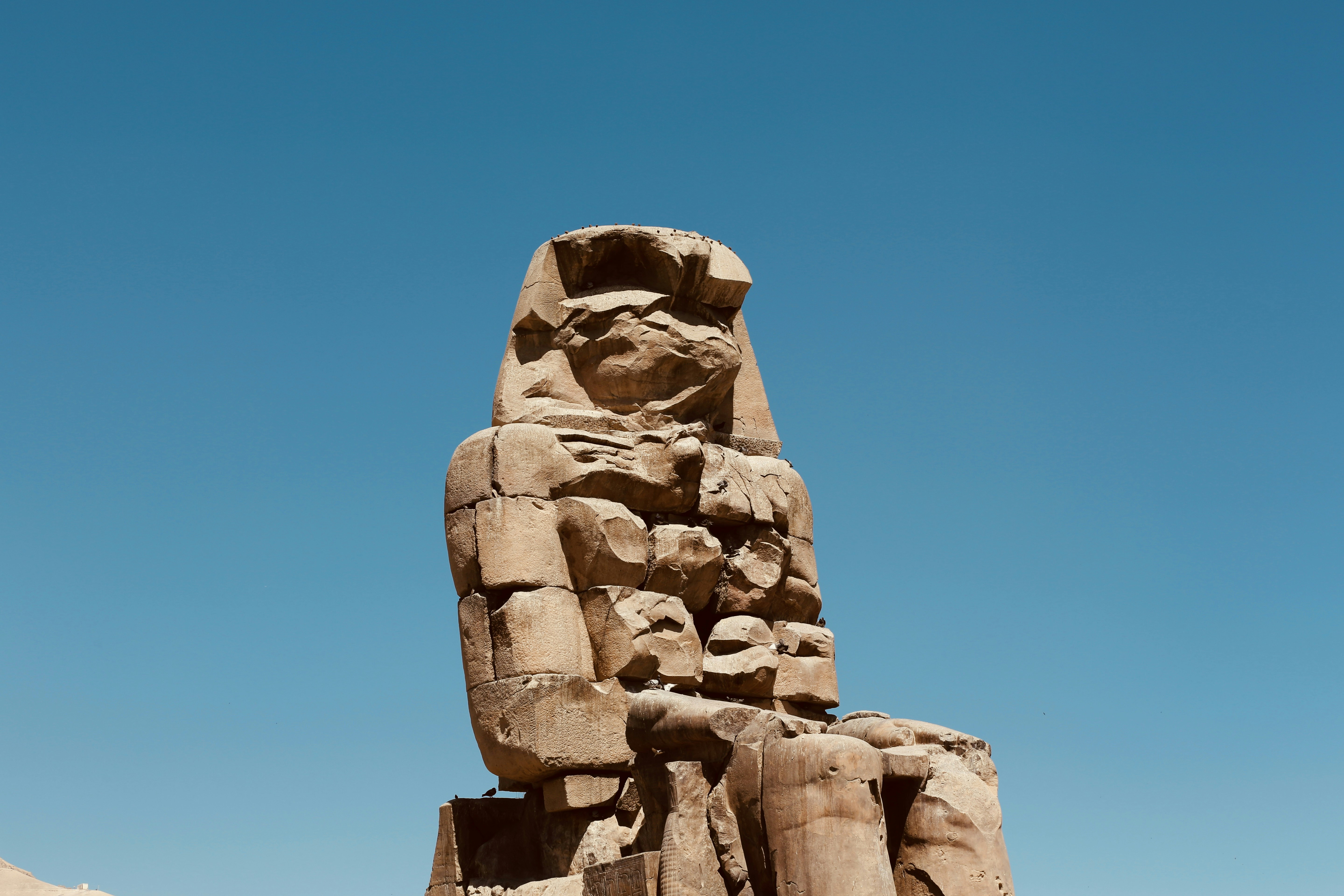 Low angle photo of egyptian god statue