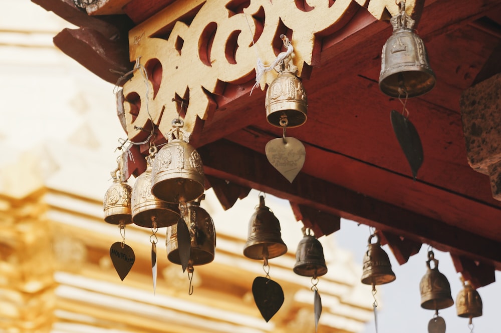 hanged brass-colored bells