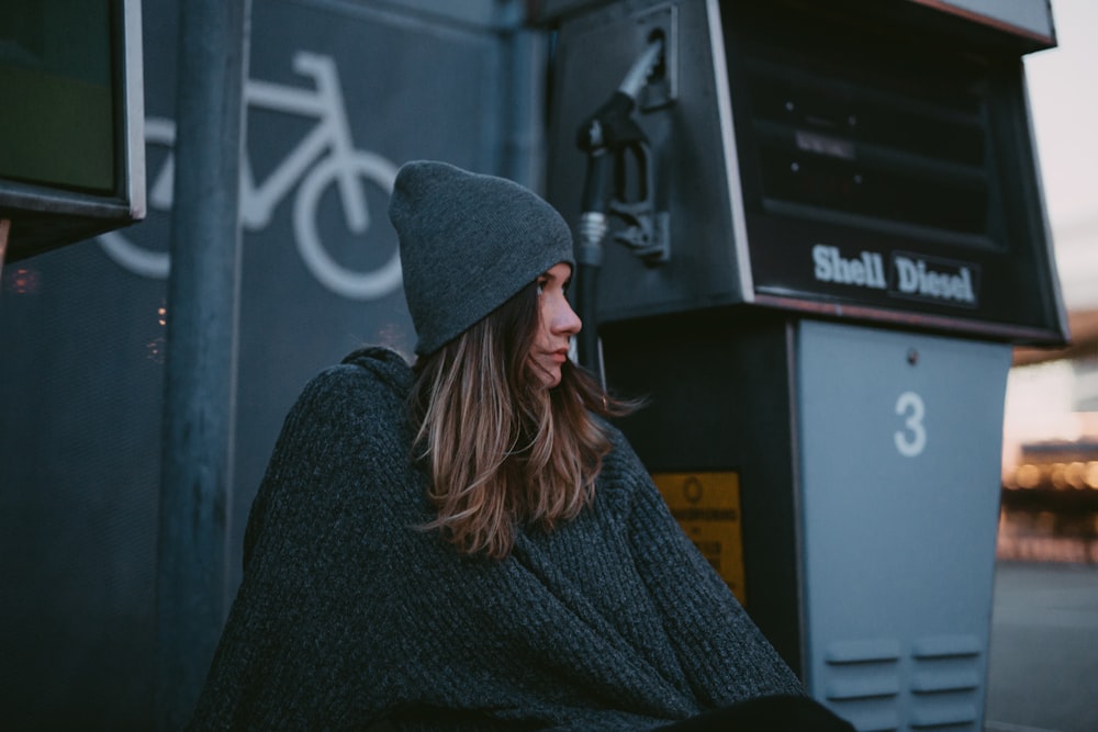 woman wearing black knit cap