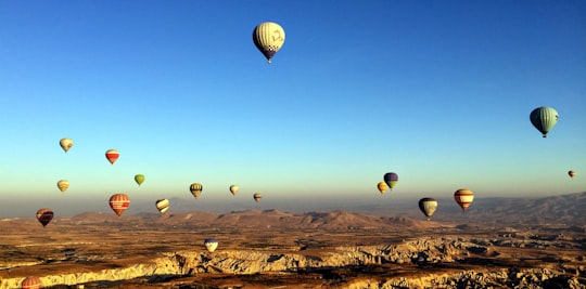 hot air balloons in the the sky in Cappadocia Turkey