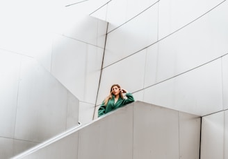 woman resting arms on concrete stair