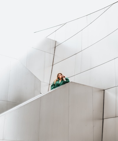 woman resting arms on concrete stair