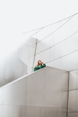 woman resting arms on concrete stair