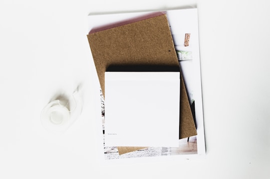 A variety of eco-friendly adhesive paper tapes displayed on a wooden surface.