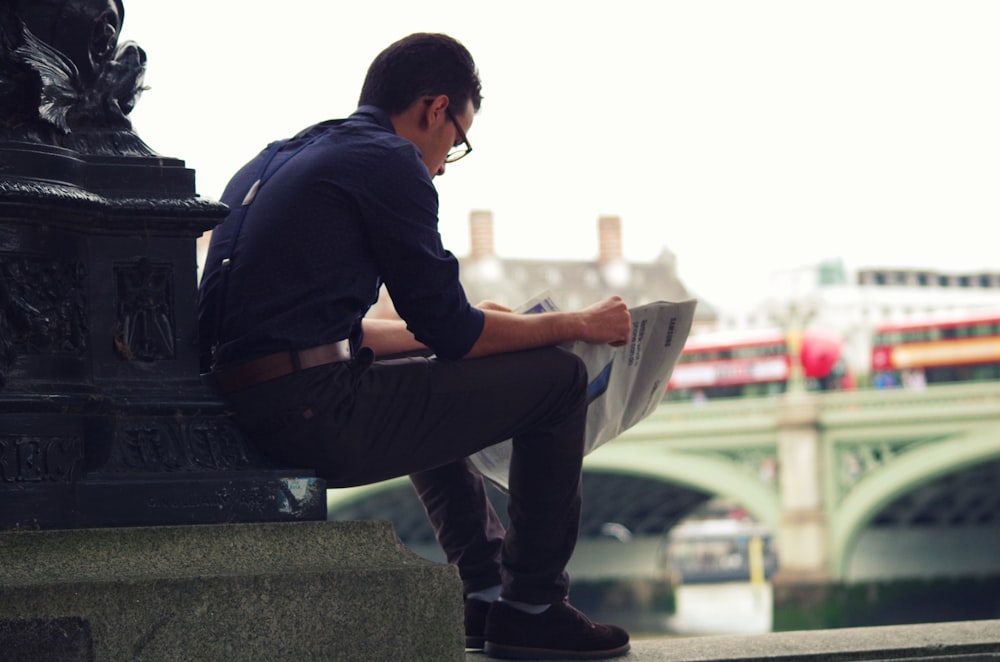 man reading a newspaper