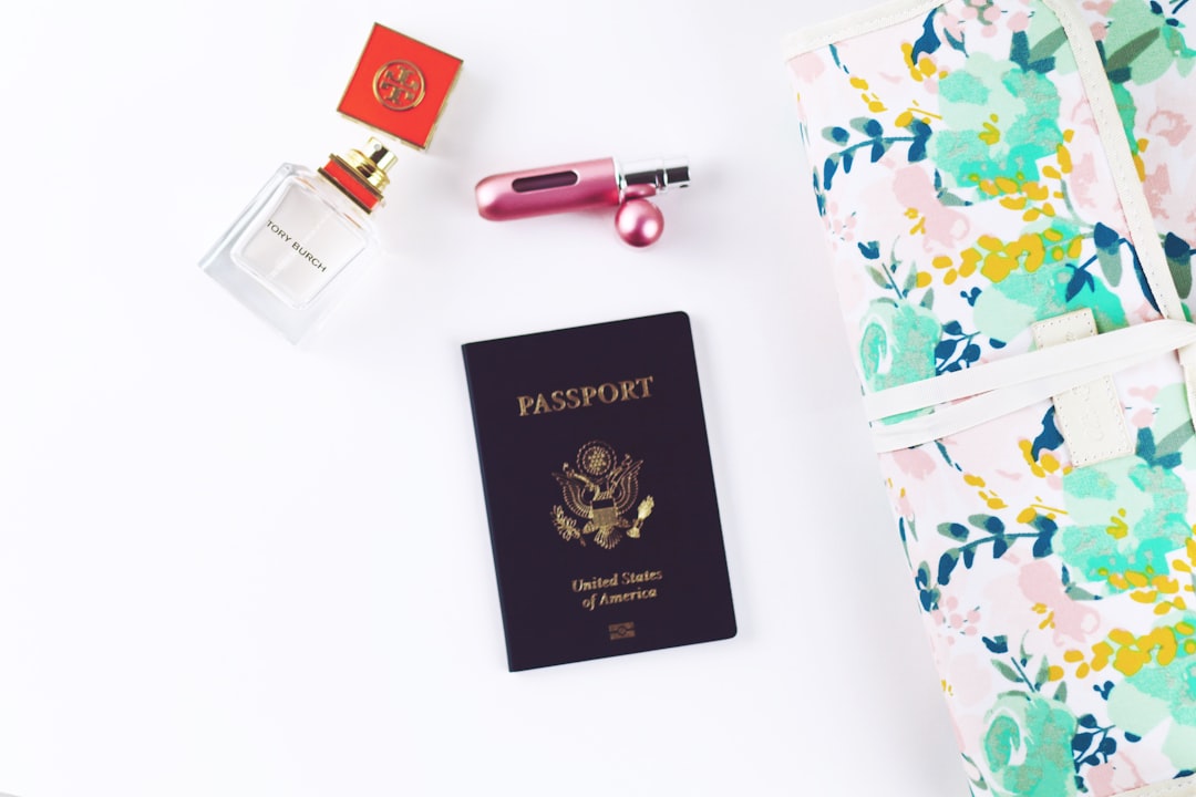 passport on top of white surface, www.everygirlboss.com