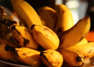 selective focus photography of ripped bananas