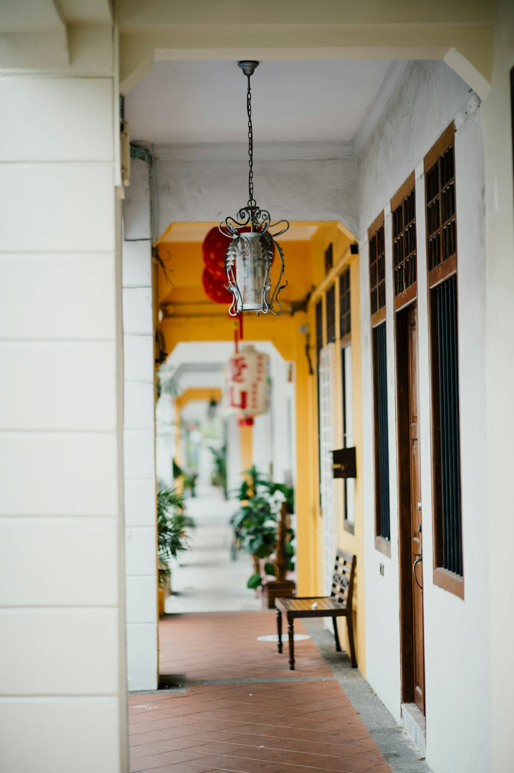 white pendant lamp on hallway