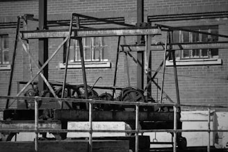 Historic black and white photo of the original Zeenat Printing Works factory building in 1943.