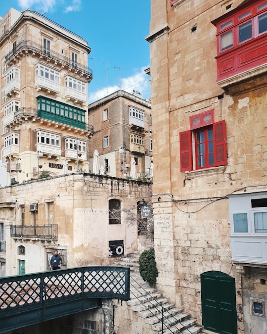 brown and red concrete building during daytime in Fort St. Elmo Malta