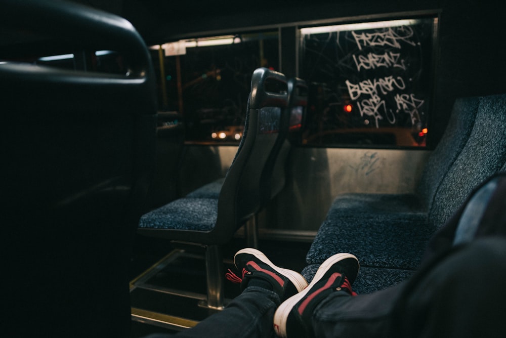 photo of person sitting inside bus