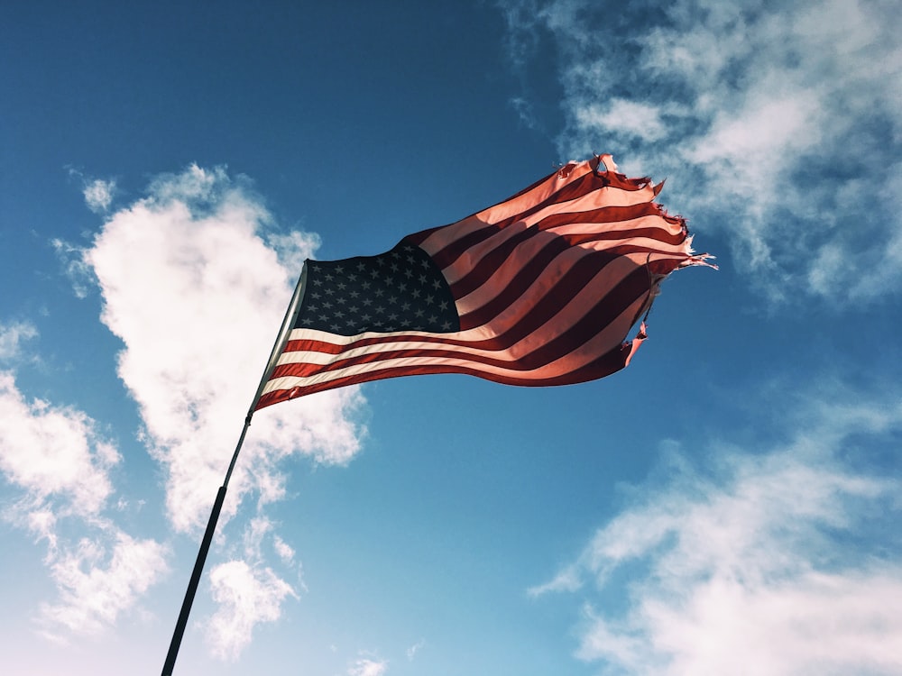 low angle of U.S.A flag on pole