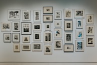 A minimalist gallery wall showcasing framed design prints.
