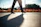 Photo of a customer walking in stylish casual sandals on a sunny street