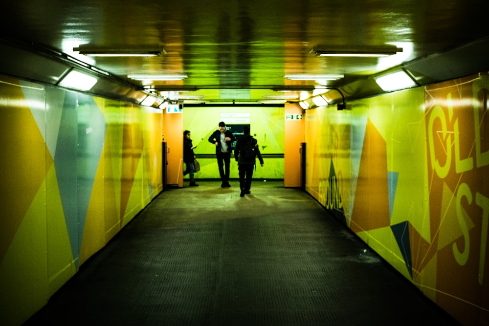 man walking on hallway