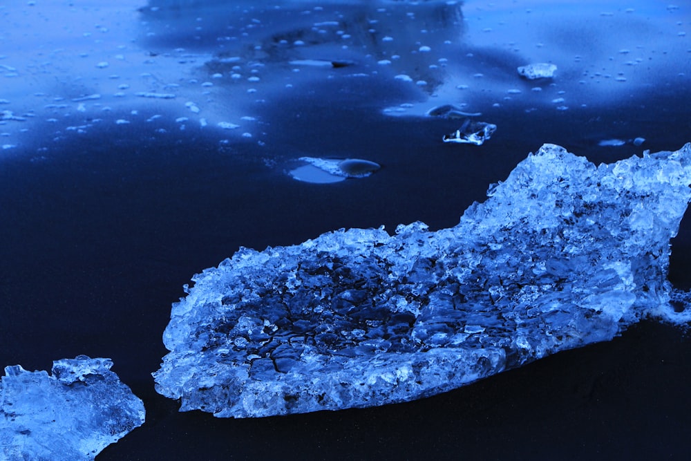 ice berg on body of water