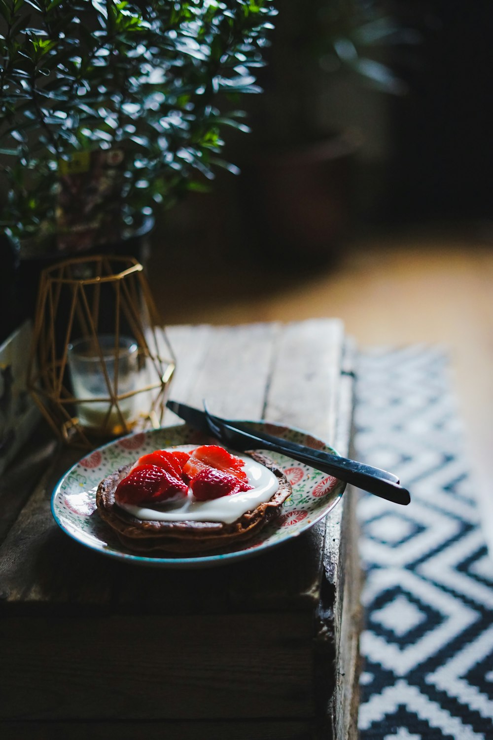 waffle with strawberries on plate