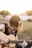woman playing acoustic guitar