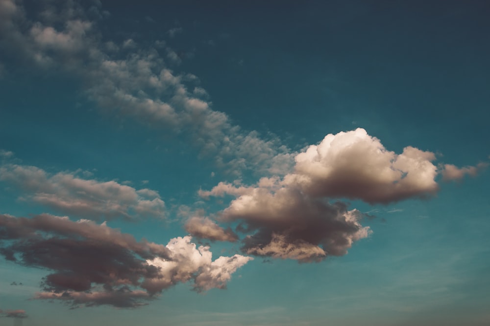 cumulus clouds under blue sky