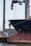 blue and red ship at daytime