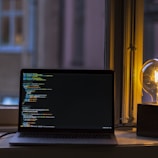turned on gray laptop computer