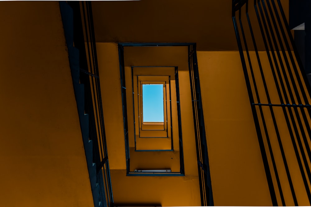 low angle photography of brown concrete building