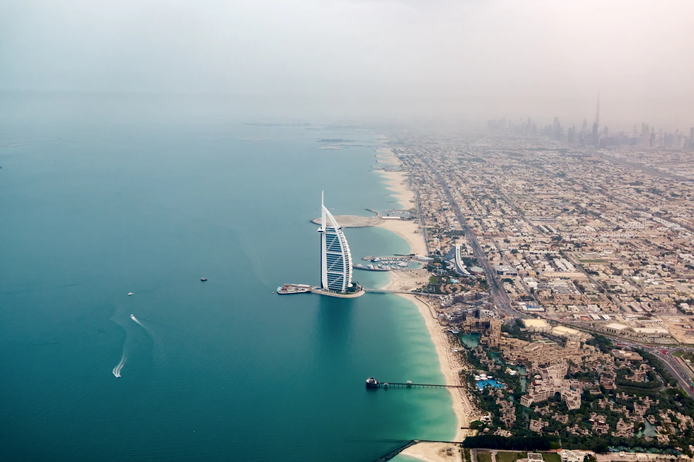 Aerial view of the Burj Al Arab hotel standing on the water