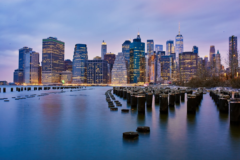 city buildings during nighttime in panoramic view photography